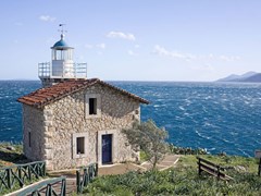 09_The-lighthouse-in-the-area-of-Astros,-Peloponnese,-Greece,-overlooking-the-Aegean-sea