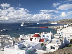 12_Mykonos-Cruise-ships-docked-at-a-port-on-the-shoreline-of-Mykonos,-Greece.