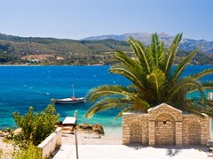 13_Yacht-and-palm-tree-by-Mediterranean-beach.-Samos-Island,-Greece.