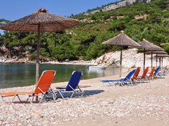 13_Romantic-beach-with-deck-chairs-and-sun-umbrellas,-island-Thassos,-Greece